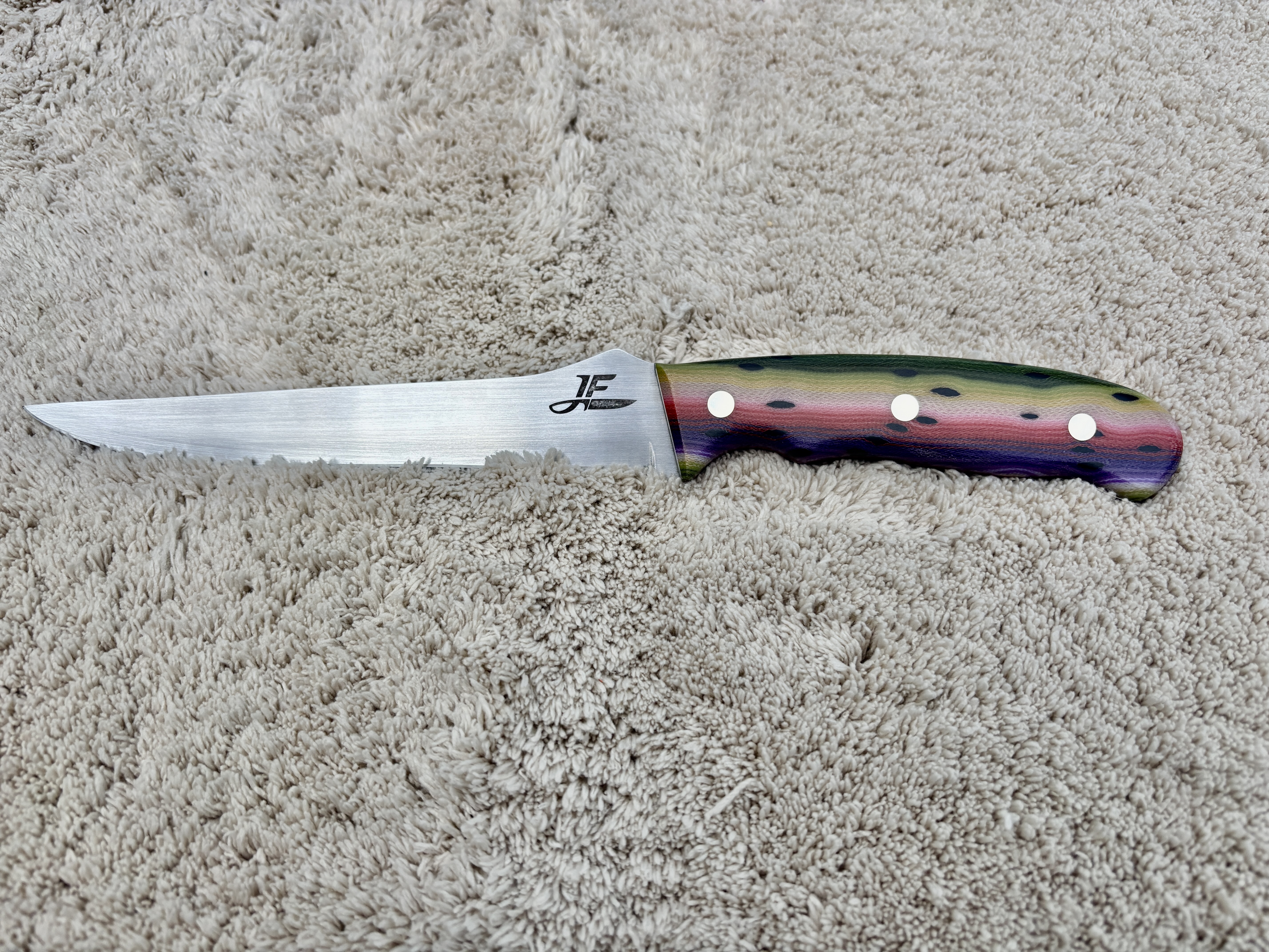 Fish filet knife with rainbow trout G-carta handles - front view