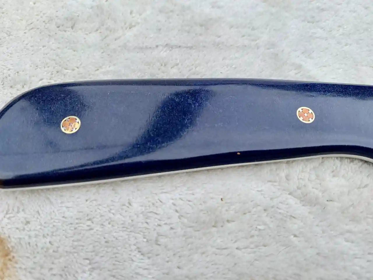 Stainless steel slim skinner with canyon blue Richlite handles - mosaic pin closeup 2