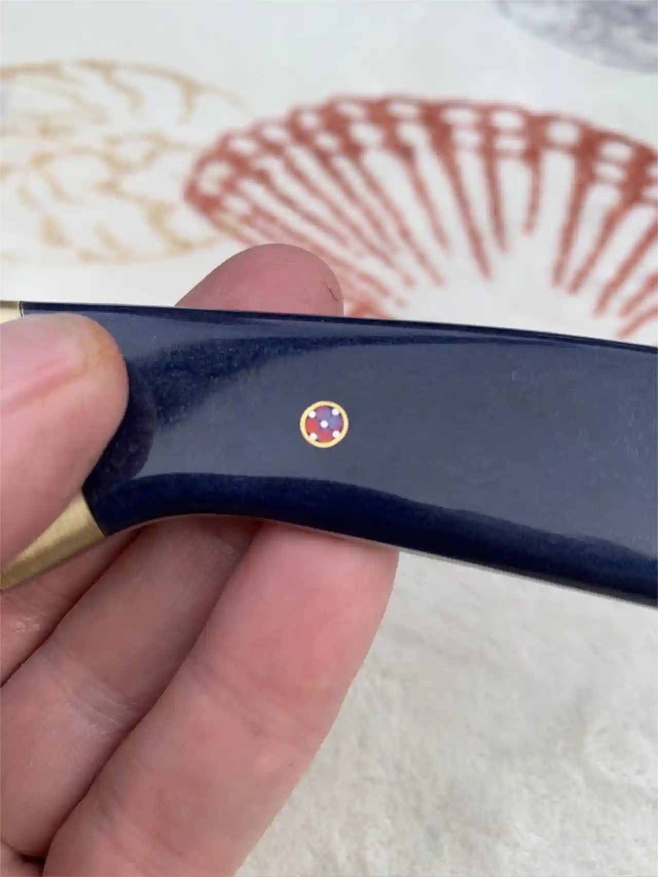 Stainless steel slim skinner with canyon blue Richlite handles - mosaic pin closeup 3