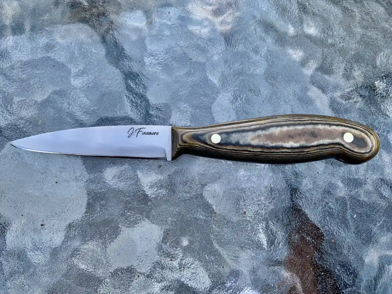 Kitchen paring knife with tri-colored Richlite handles - front view
