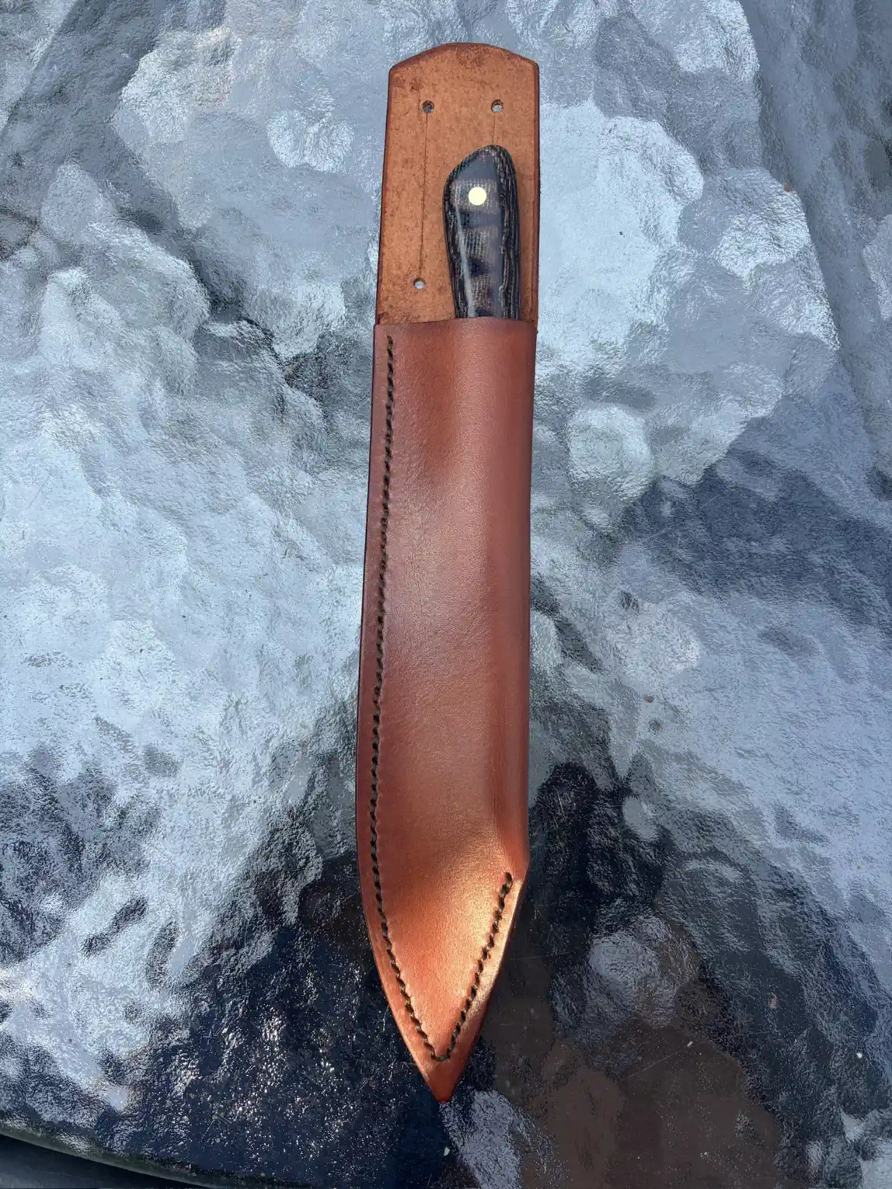 Bird and trout knife with python micarta handles in custom leather sheath