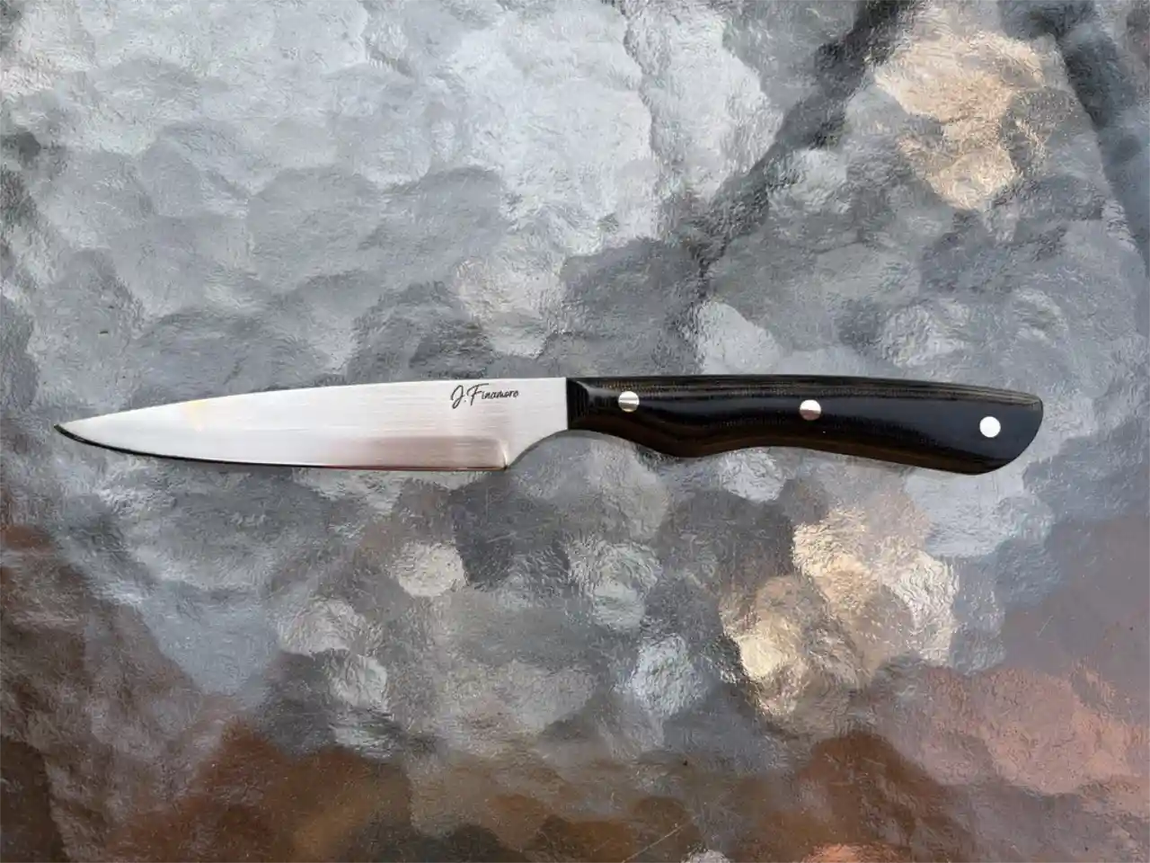 Bird and trout knife with black micarta handles - front view