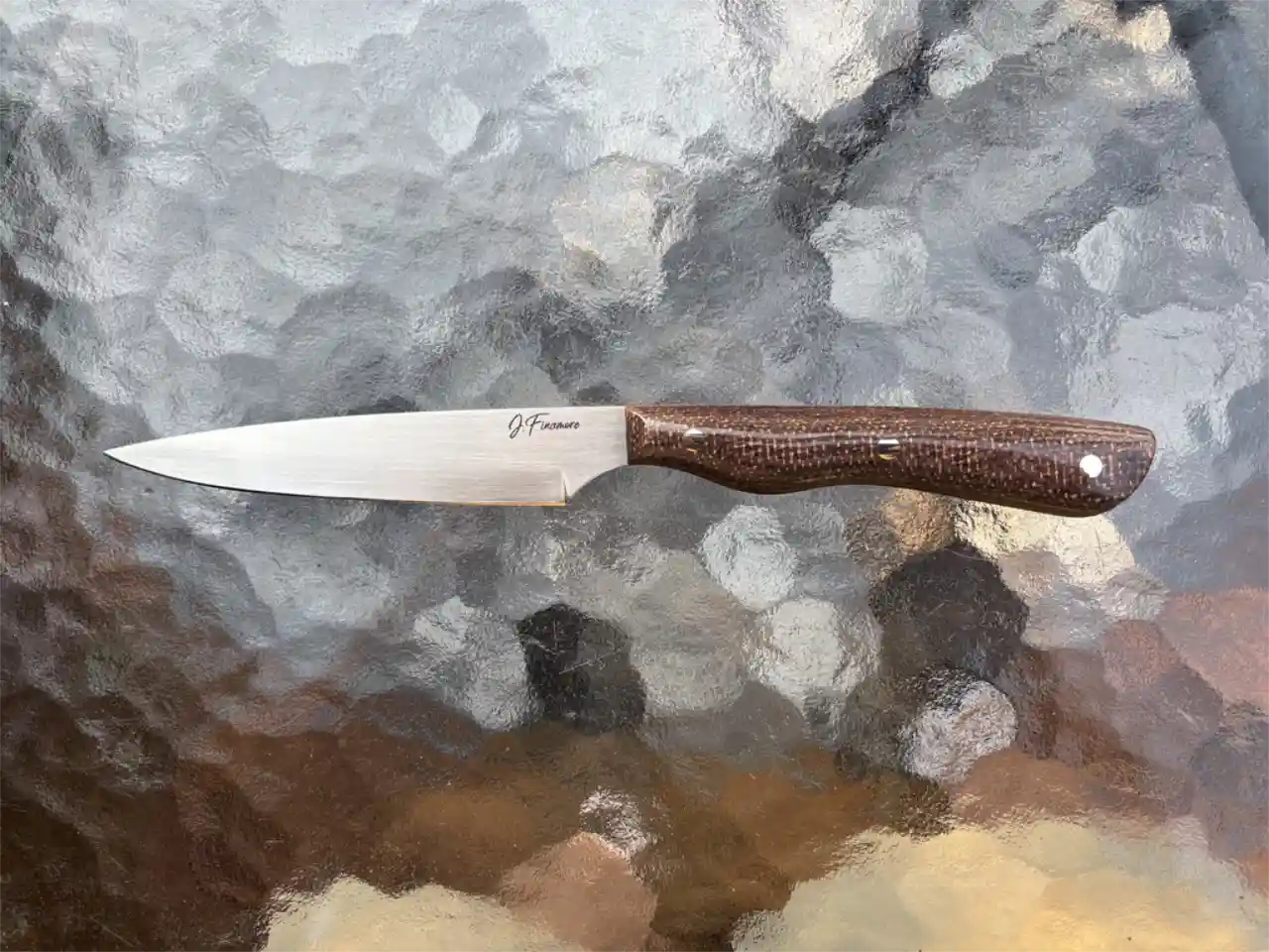 Bird and trout knife with bison colored micarta handles - front view
