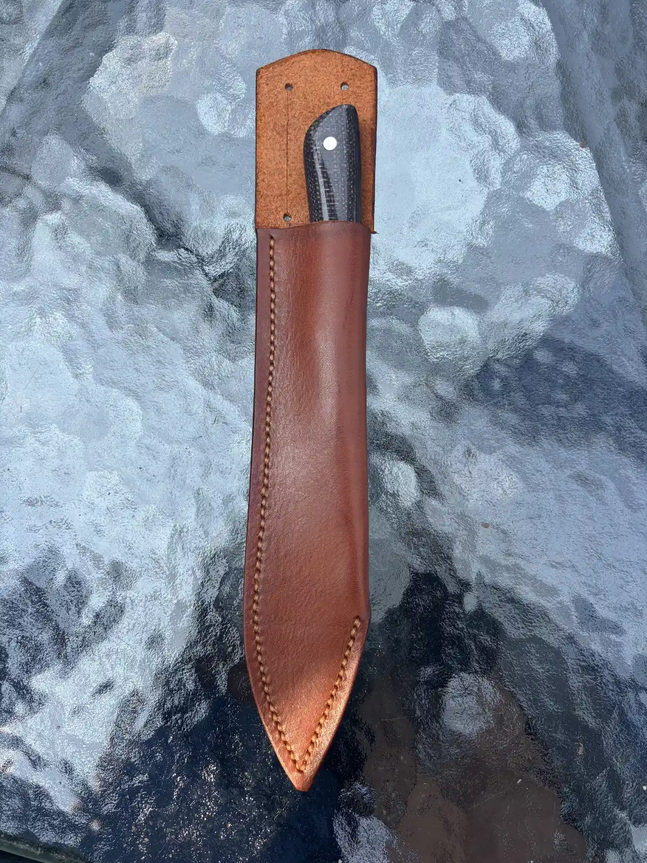 Bird and trout knife with bison colored micarta handles in custom leather sheath