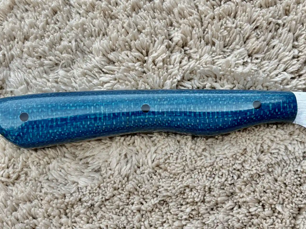 Bird and trout knife with admiral blue jute micarta handles - closeup of handle, rear view