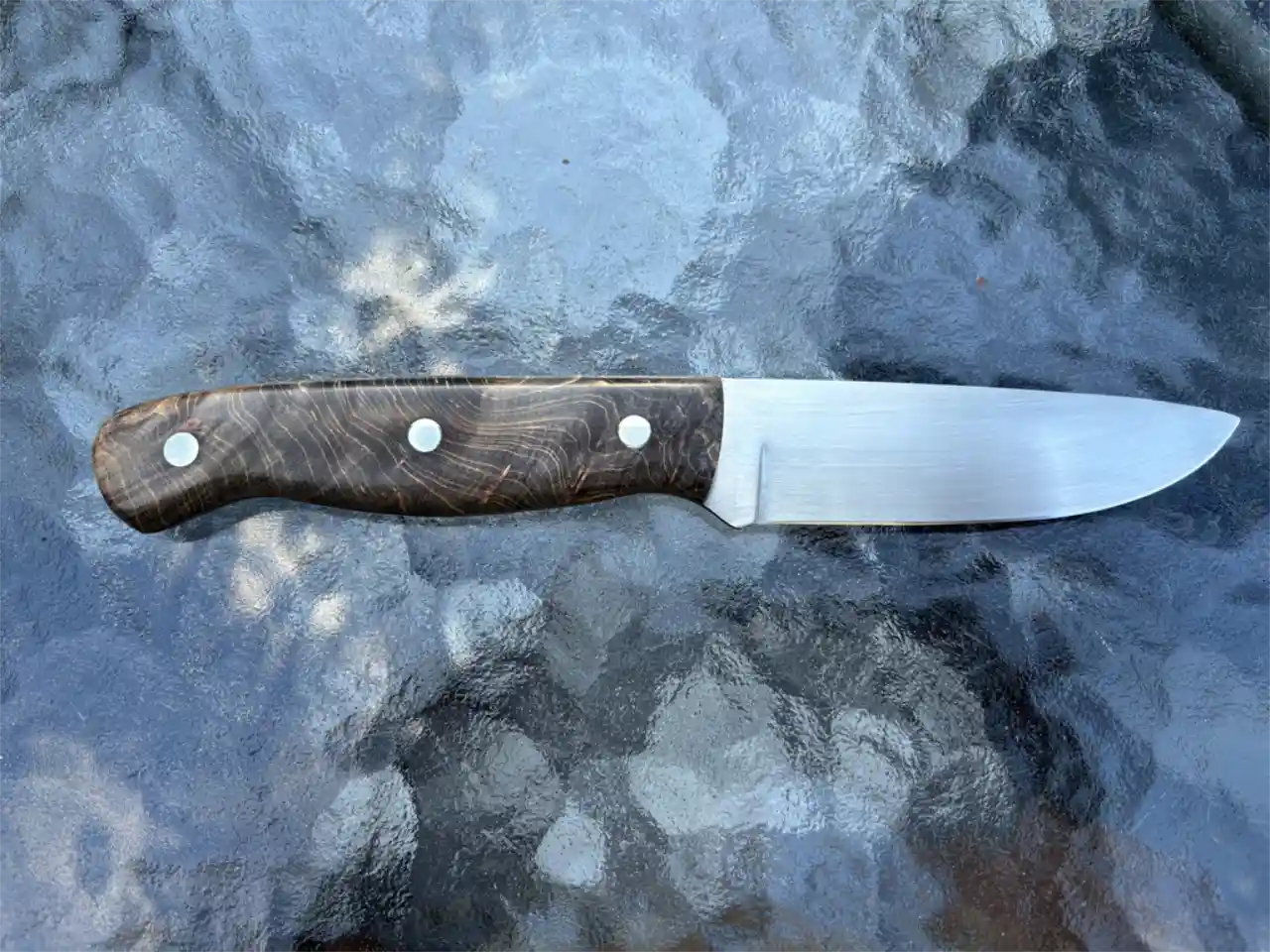 Bushcraft knife with dyed maple burl wood handles - rear view