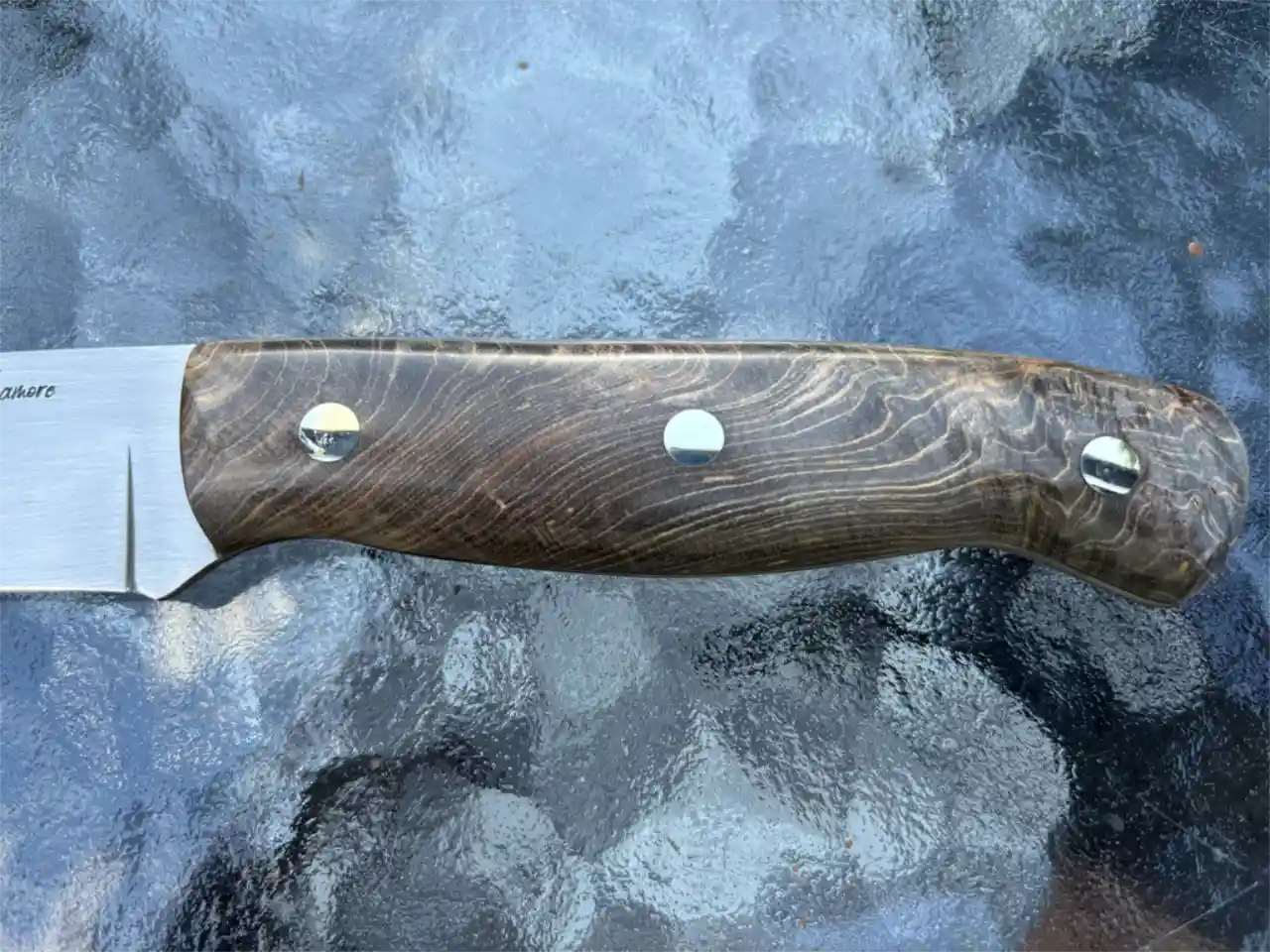 Bushcraft knife with dyed maple burl wood handles - closeup of handle, front view