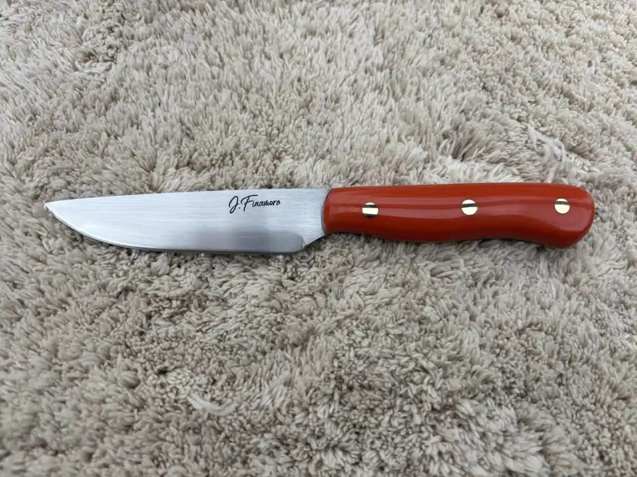 Kitchen paring knife with bengal orange micarta handles - rear view