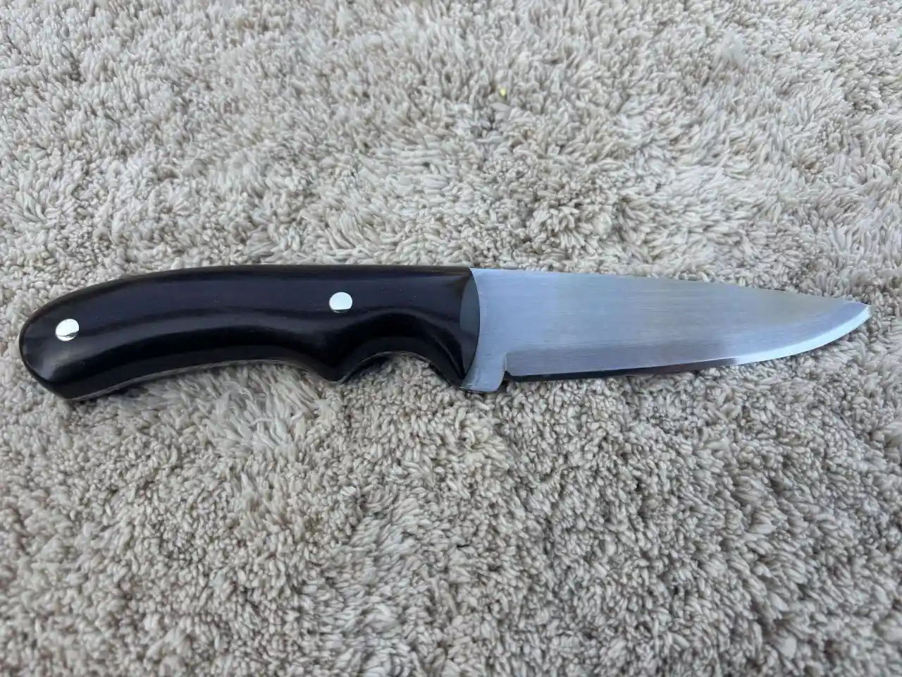 Bushcraft knife with natural ebony wood handles - rear view