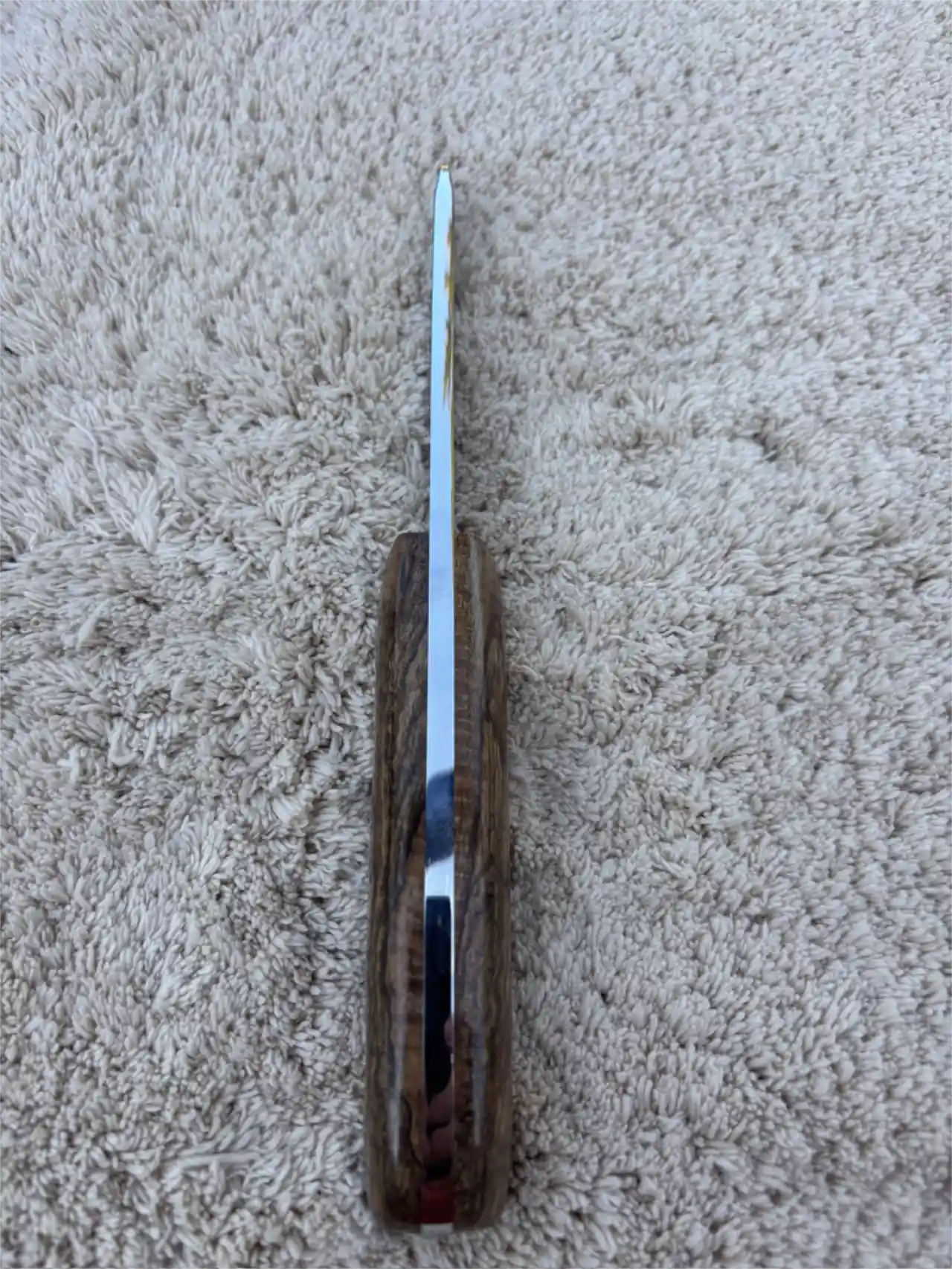 Bushcraft knife with curly mango wood handles - spine view