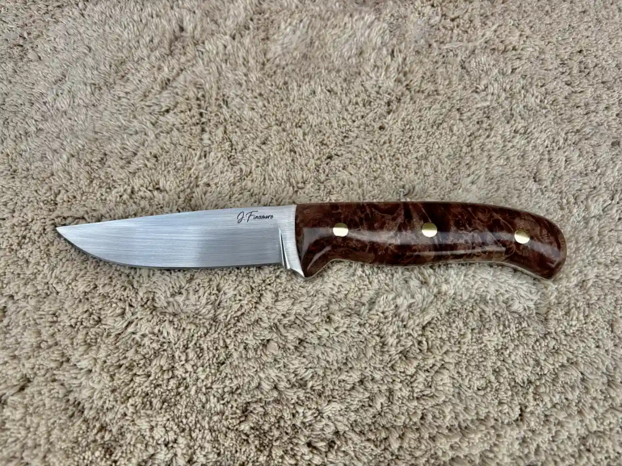 Bushcraft knife with maple burl wood handles - front view