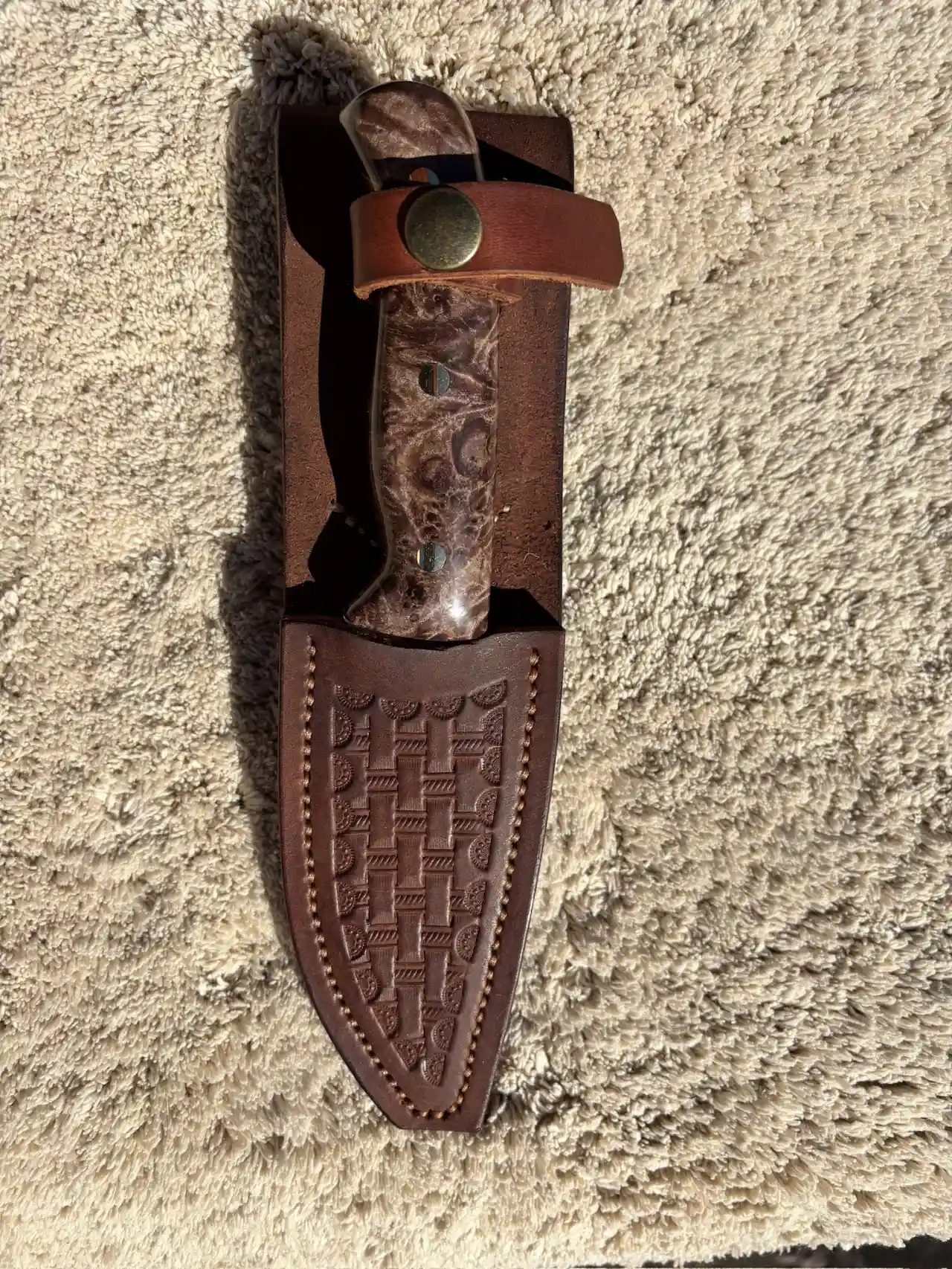 Bushcraft knife with maple burl wood handles in a custom, hand tooled, leather sheath