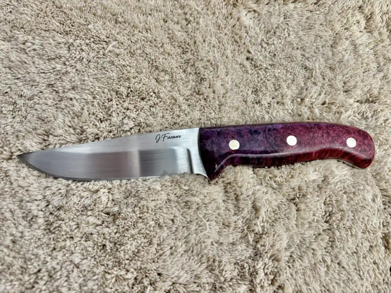 Bushcraft knife with dyed box elder wood handles - front view