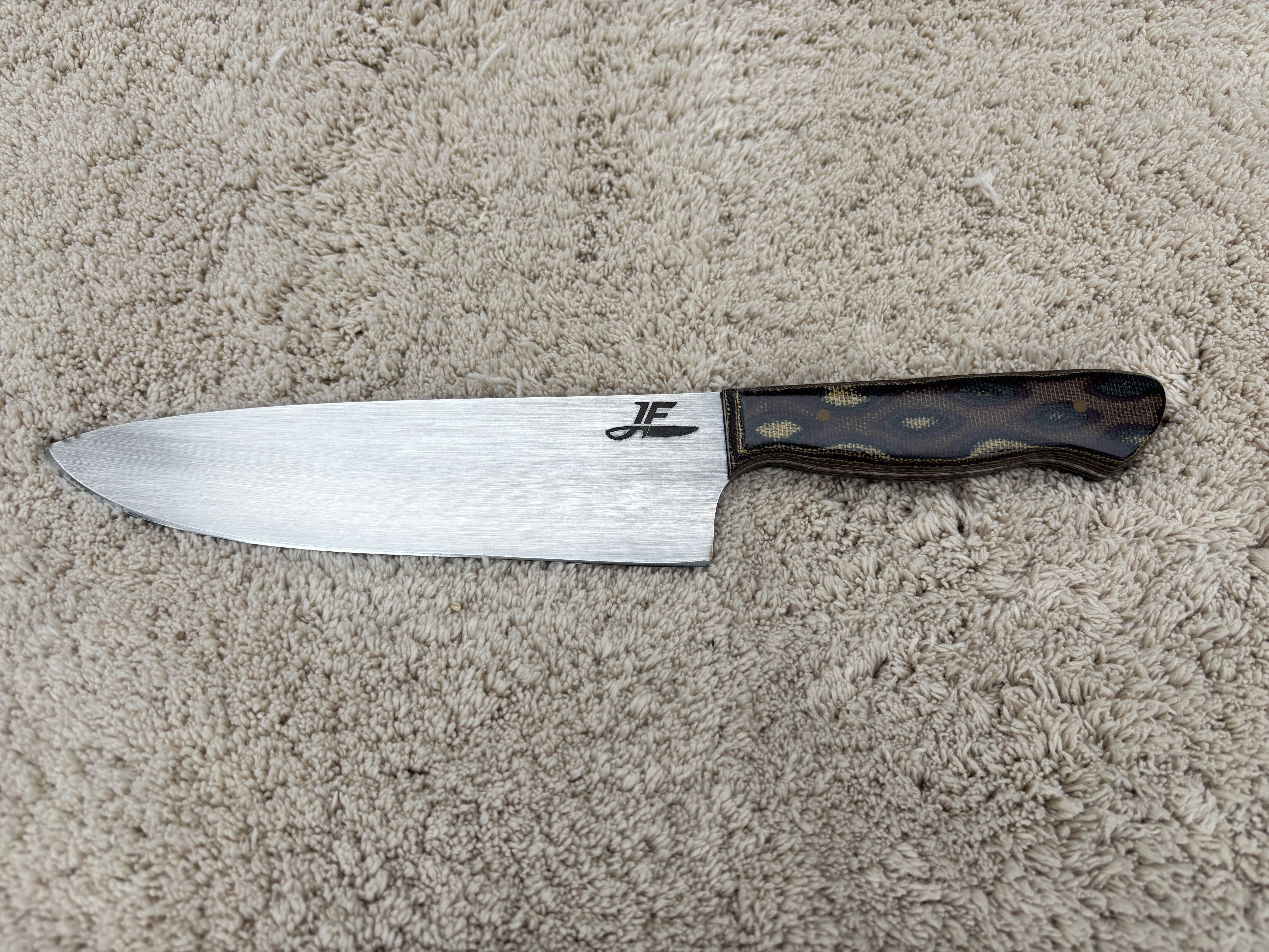 Chefs knife with pythom pattern micarta handles - Front view