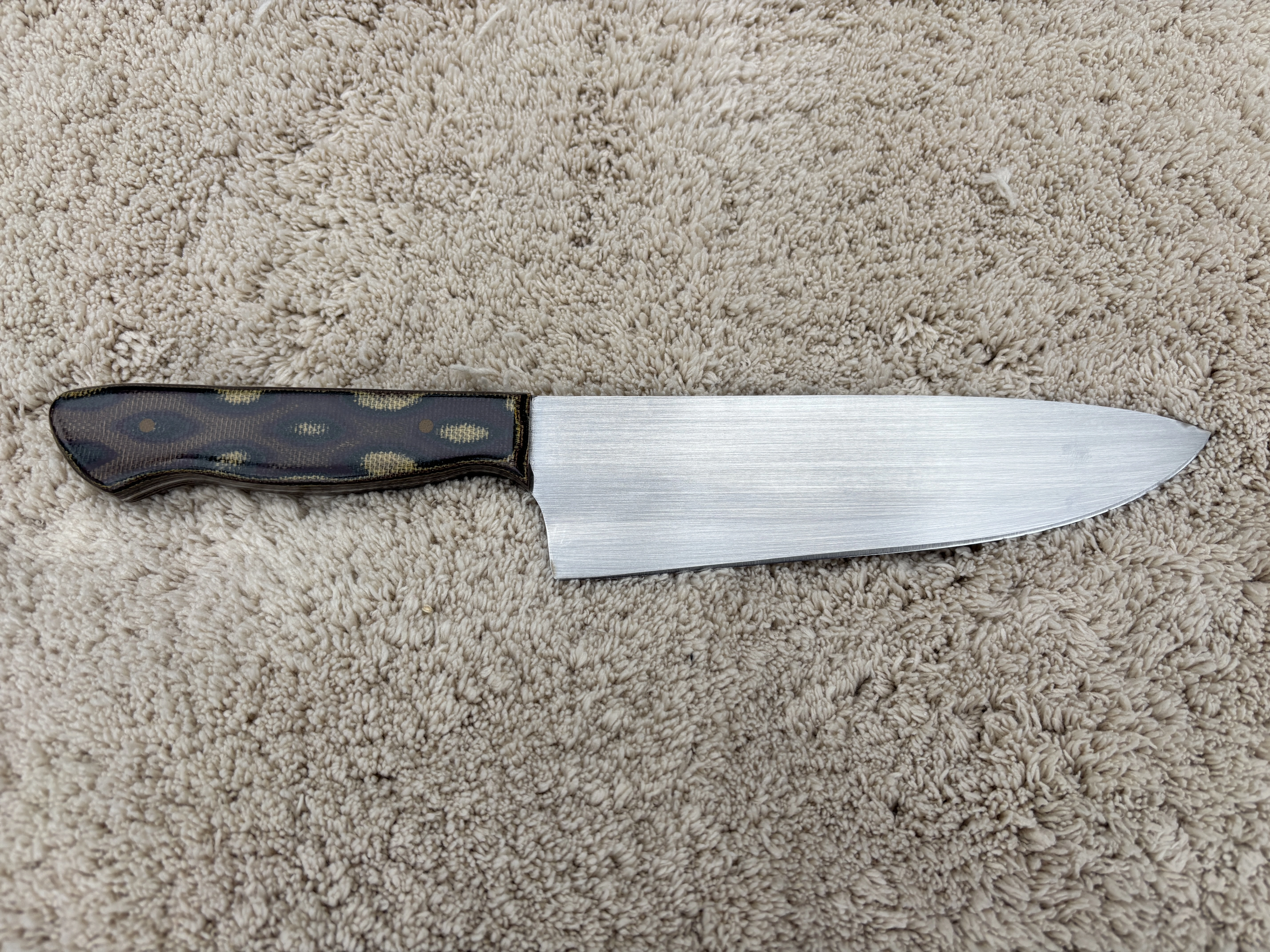 Chefs knife with pythom pattern micarta handles - Rear view