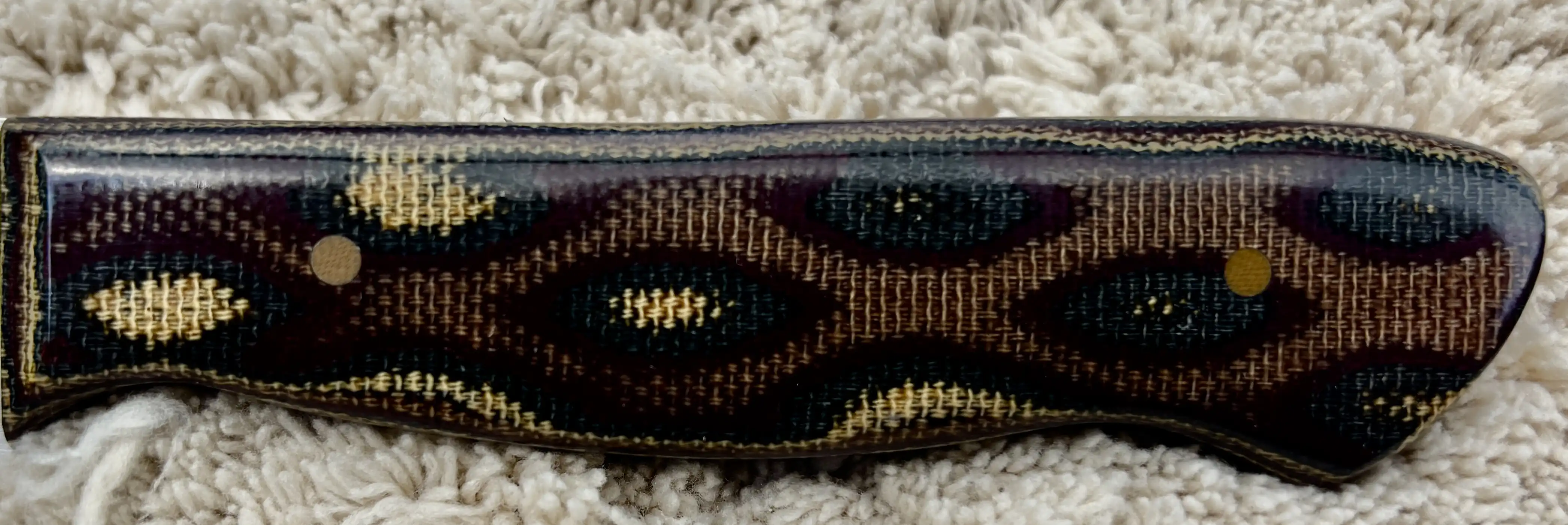Chefs knife with pythom pattern micarta handles - Handle view