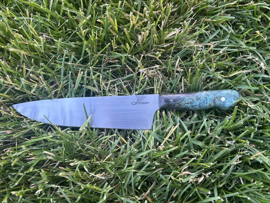 Chefs knife with stabilized karelian birch wood handles - Front outside view