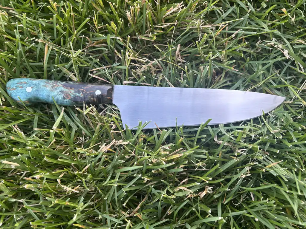 Chefs knife with stabilized karelian birch wood handles - Rear outside view