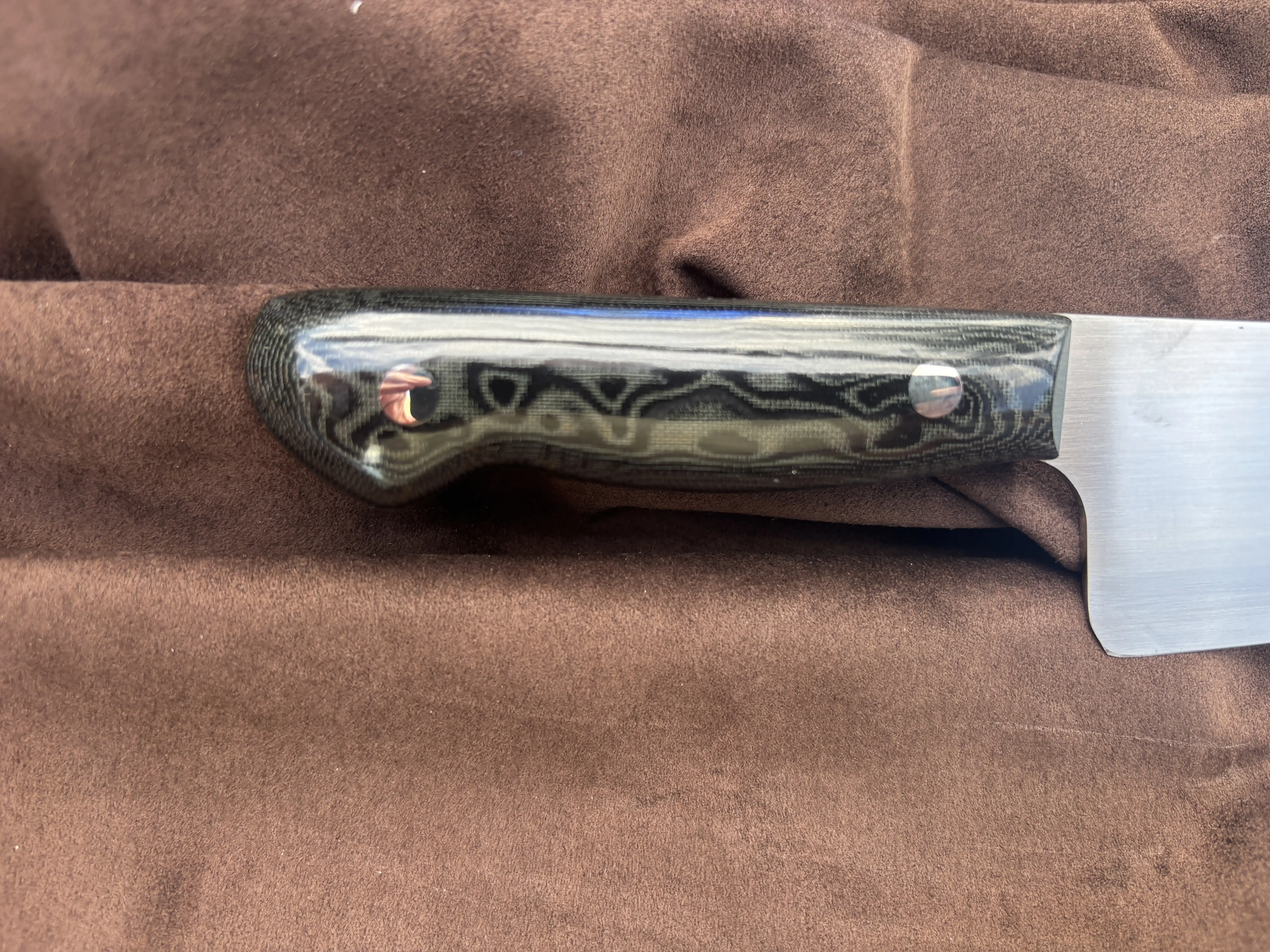 Chefs knife with black snakeskin micarta handles - Rear handle view