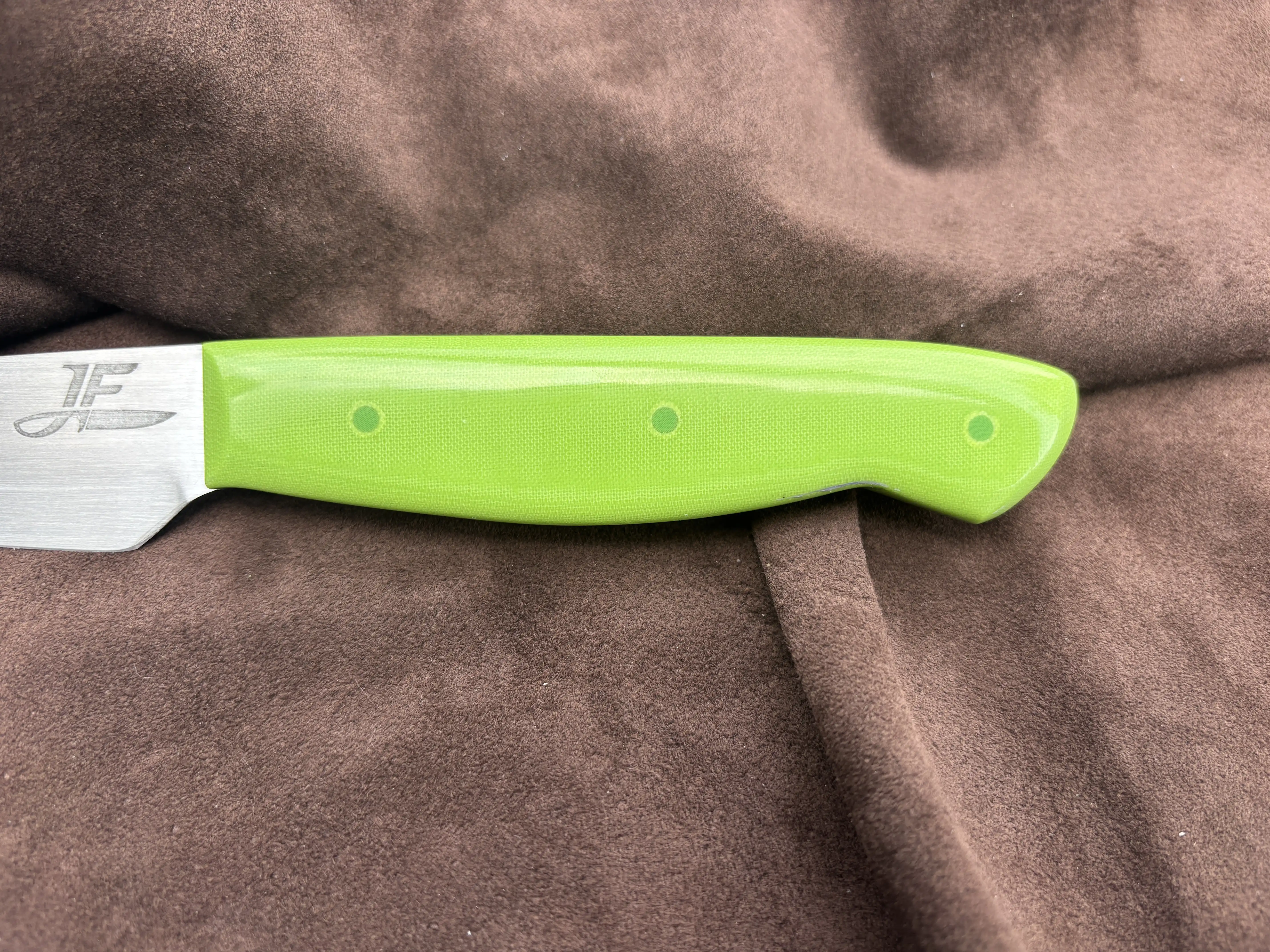 Kitchen utility knife with pistachio colored micarta handles - Front handle view